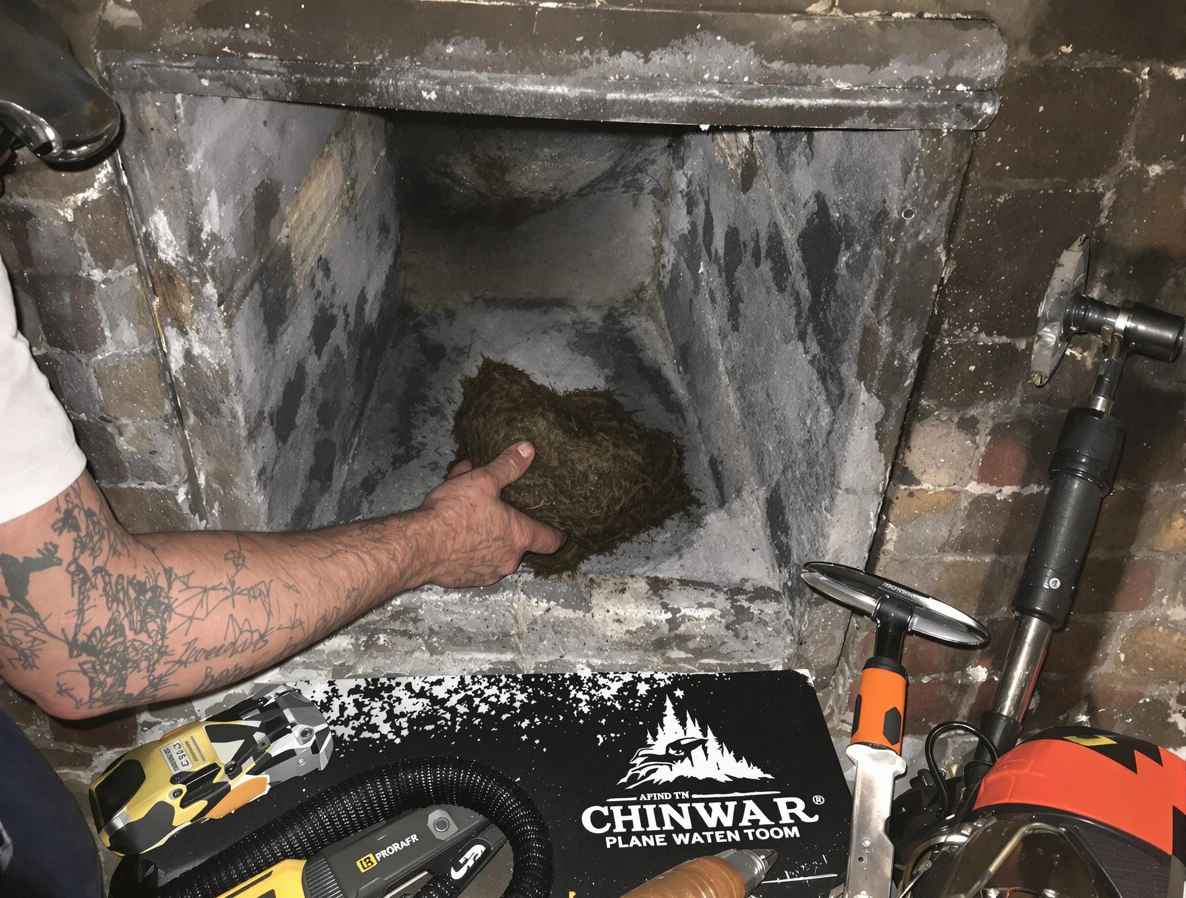 Ashland City Chimney Sweep safely removing debris and screening chimney in Ashland City, TN